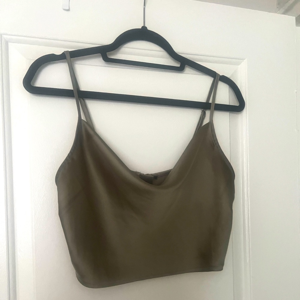 Satin cowl crop top, with adjustable straps.Brand unknown. Like new w/out tags.